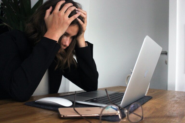 frustrated woman on laptop