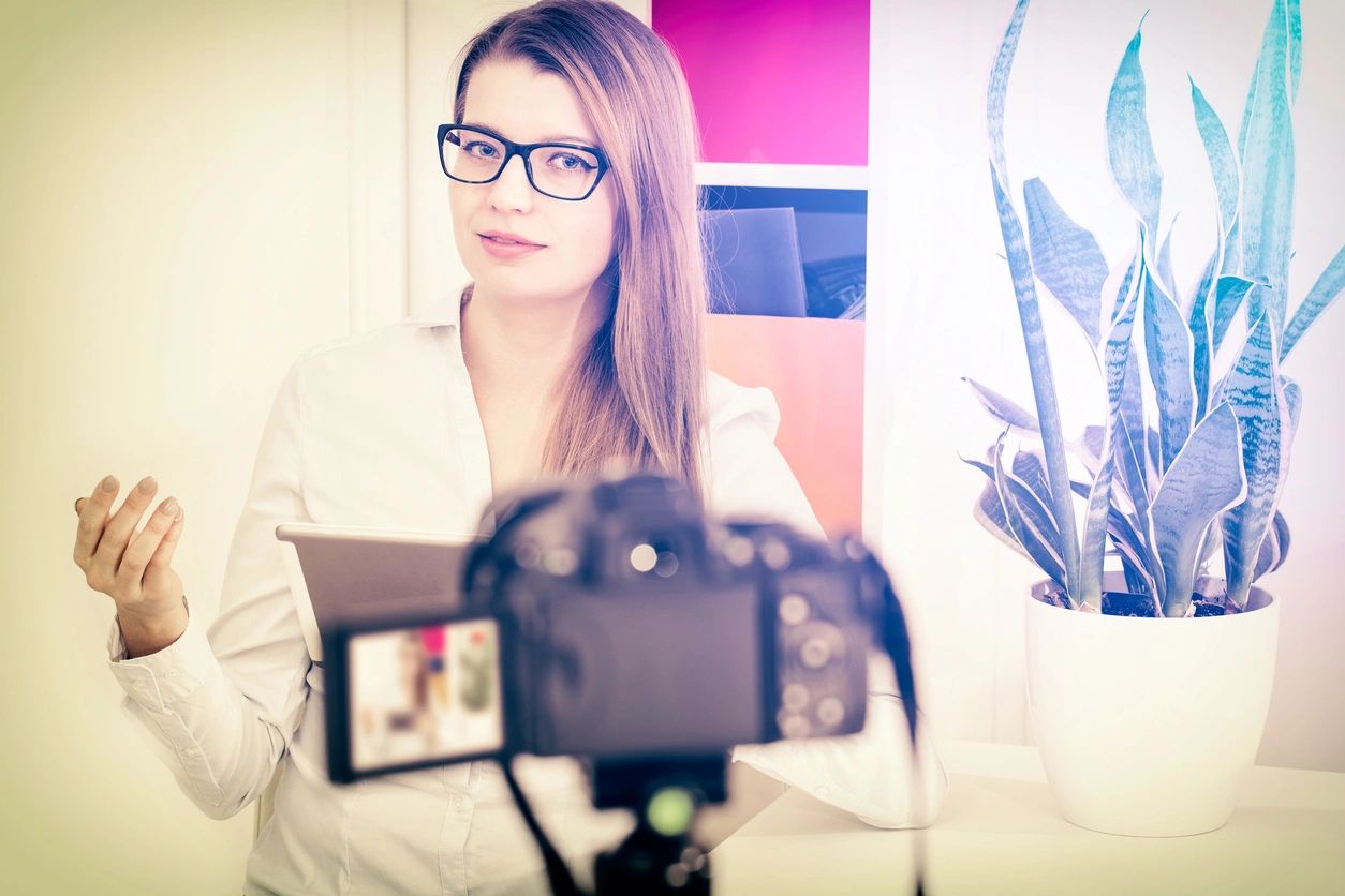 Woman recording podcast